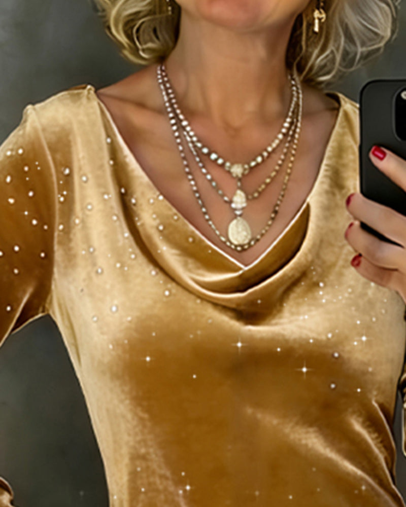 Kleid mit feinem Schimmer und gerader Silhouette