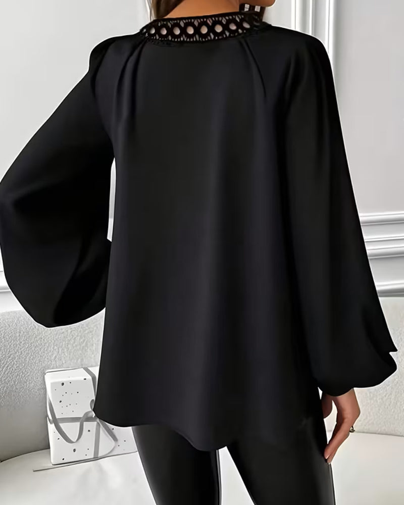 Lockere Bluse mit V-Ausschnitt und Puffärmeln