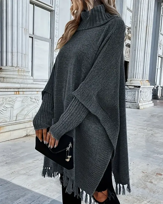 Rollkragenpullover Mit Fledermausärmeln Und Quasten