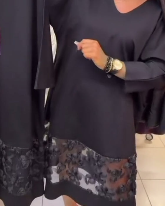 Stilvolles Kleid mit Schleife auf dem Rücken und V-Ausschnitt