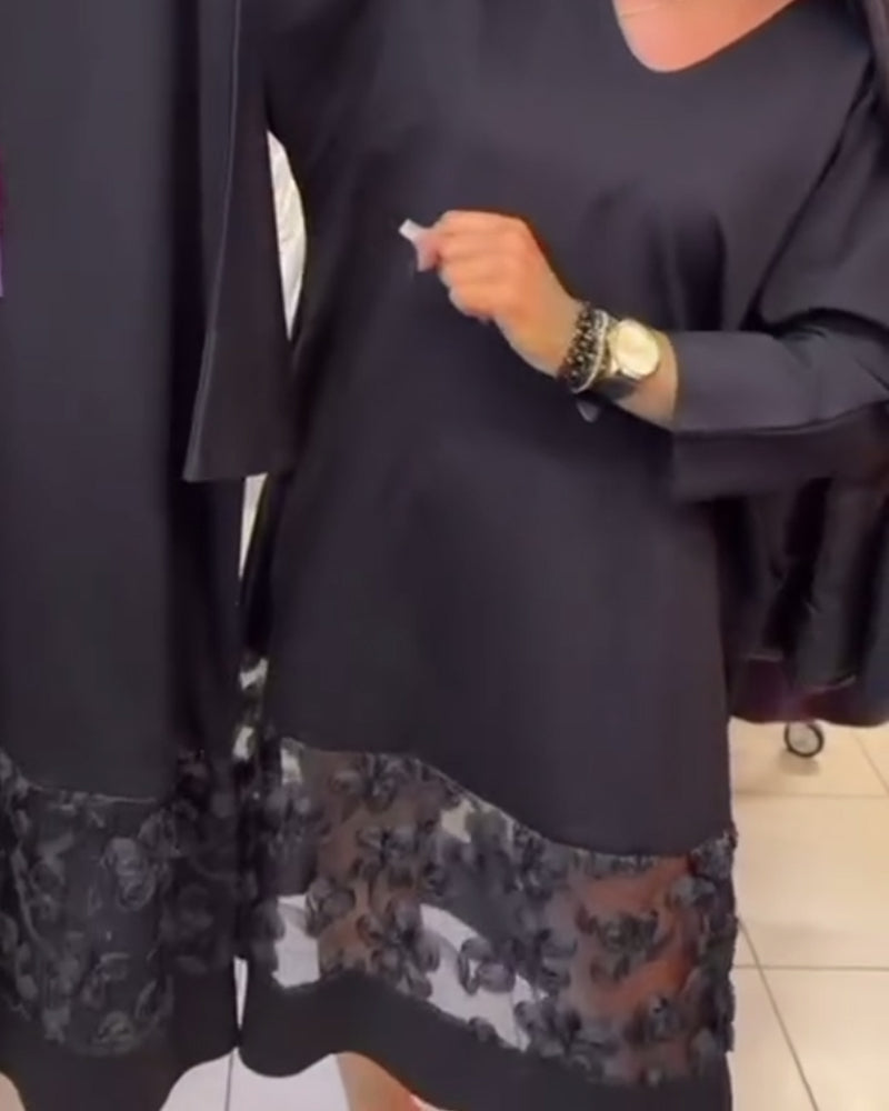 Stilvolles Kleid mit Schleife auf dem Rücken und V-Ausschnitt