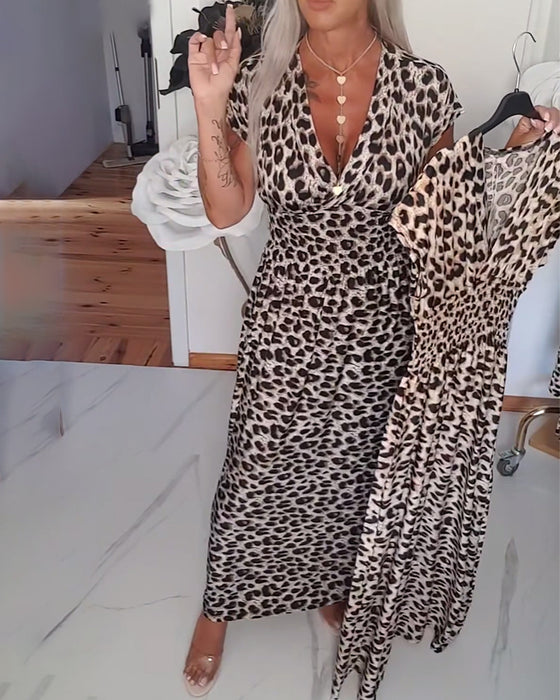 Elegantes Kleid mit Leopardenmuster und V-Ausschnitt