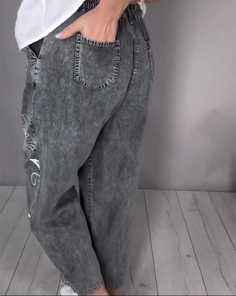 Jeans Blumendruck Abgenutzt