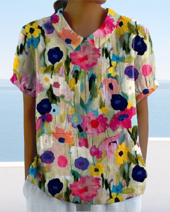 Lässige bluse mit revers-blumendruck