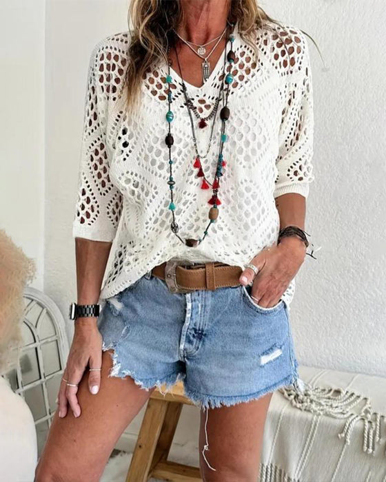 Pullover Mit Dehnbare Und Lochmuster Merkmalen