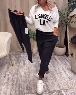 Lässige, einfarbige hose mit taschen