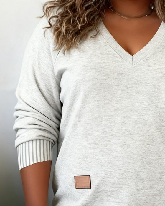 Plusgröße Top mit V-Ausschnitt und langen Ärmeln