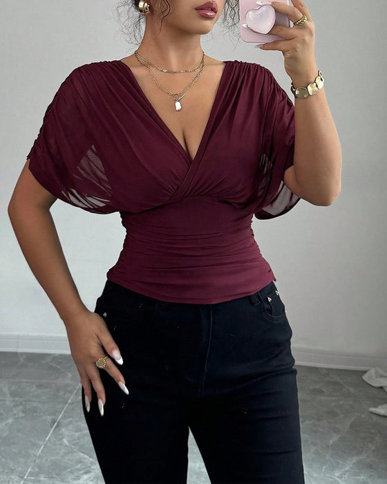 Bluse Uni Farbe Tiefer V-Ausschnitt Taille Kurzarm