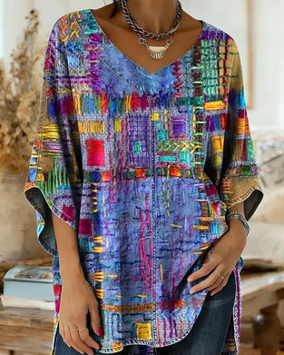 Bluse mit buntem geometrischem Druck und weiten Ärmeln
