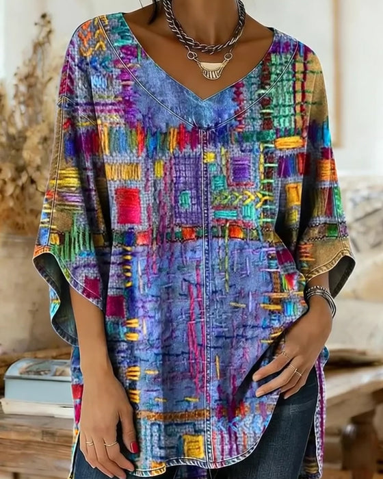Bluse mit buntem geometrischem Druck und weiten Ärmeln