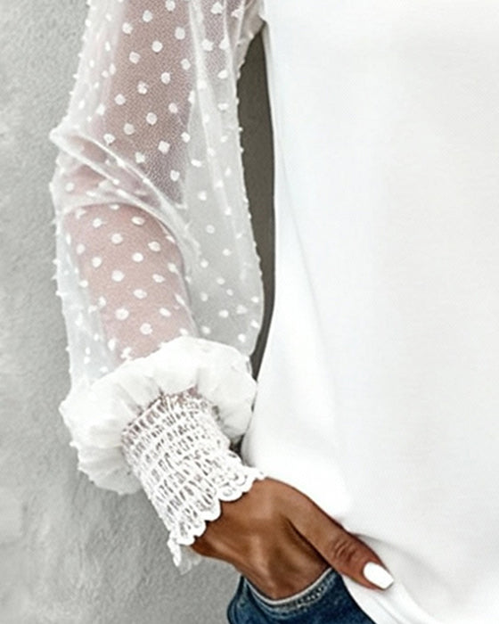 Unifarbene Bluse mit Laternenärmeln und Patchwork-Details