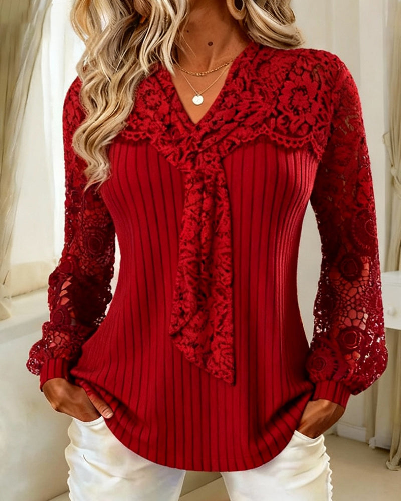 Unifarbene Bluse mit Fliege und Streifenmuster