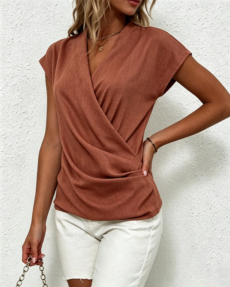Bluse mit gekreuzten Falten