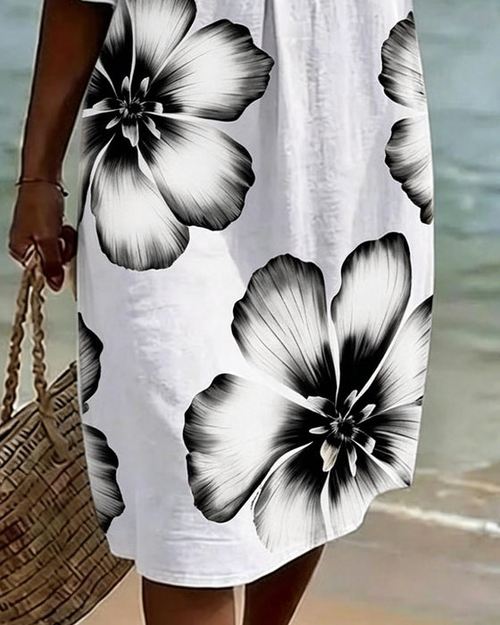Kleid Blumendruck Rüschenärmel