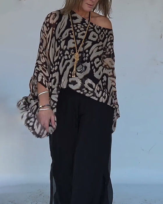 Langärmlige Bluse mit unregelmäßigem Fledermaus-Print