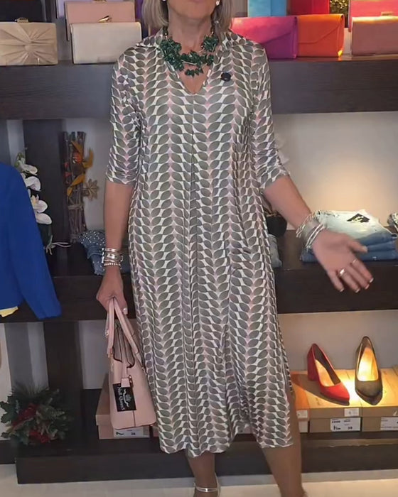 Kleid Mit Geometrischem Muster Und V-Ausschnitt