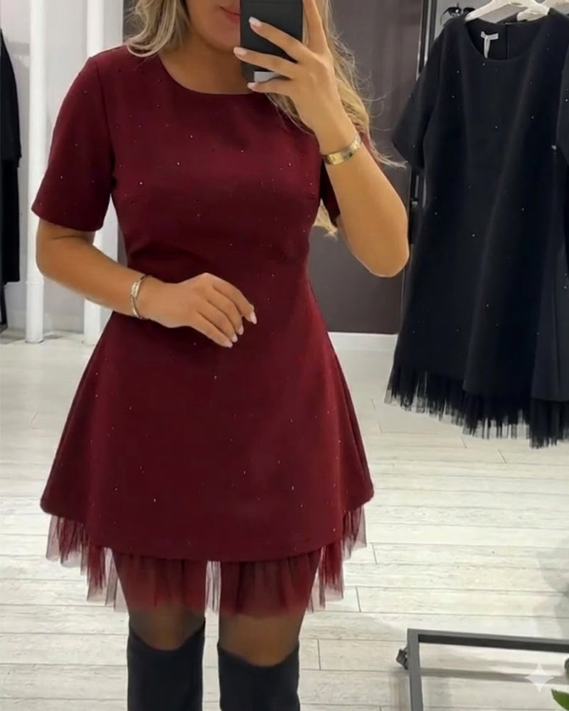 Elegantes Kleid aus schimmerndem Netz-Patchwork