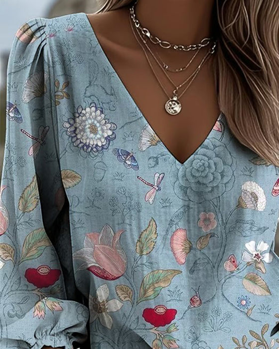 Bluse mit Blumen- und Insektenmuster Puffärmel