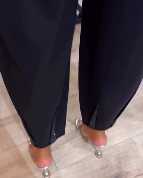 Lässige, einfarbige hose mit kordelzug und pailletten-patchwork
