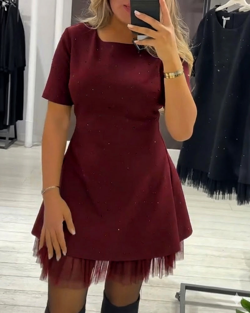 Elegantes Kleid aus schimmerndem Netz-Patchwork