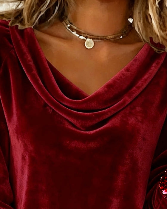 Top mit drapiertem Kragen aus Samt mit Pailletten