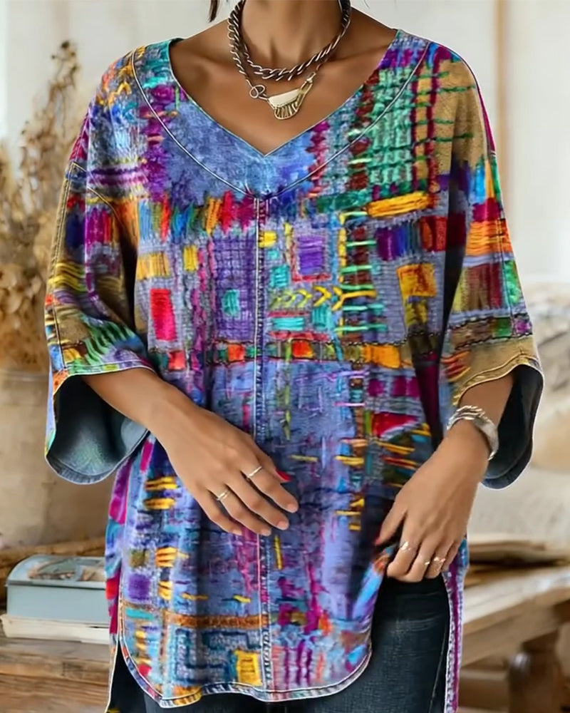 Bluse mit buntem geometrischem Druck und weiten Ärmeln