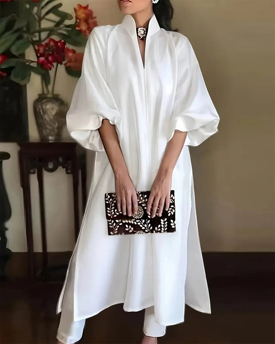 Elegantes einfarbiges Kleid mit V-Ausschnitt und Schlitz