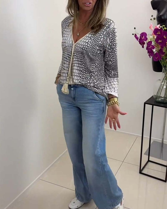 Bluse mit Blumenmuster und Schlüsselband