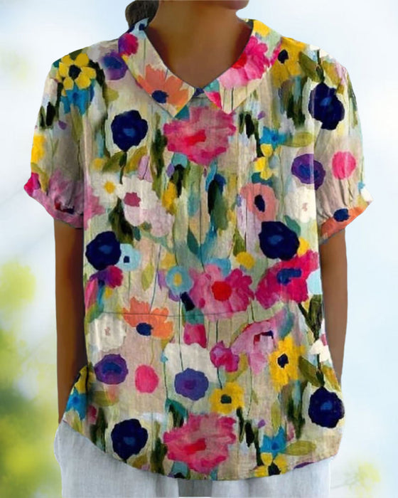 Lässige bluse mit revers-blumendruck