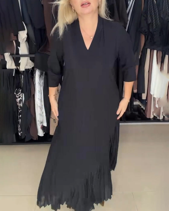 Elegantes langes Kleid mit Dreiviertelärmeln und V-Ausschnitt