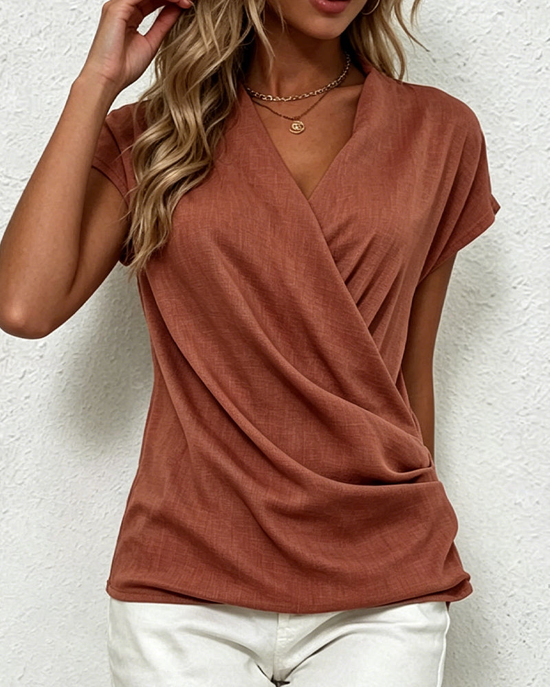 Bluse mit gekreuzten Falten