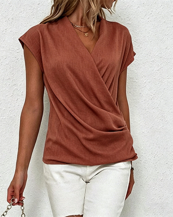 Bluse mit gekreuzten Falten