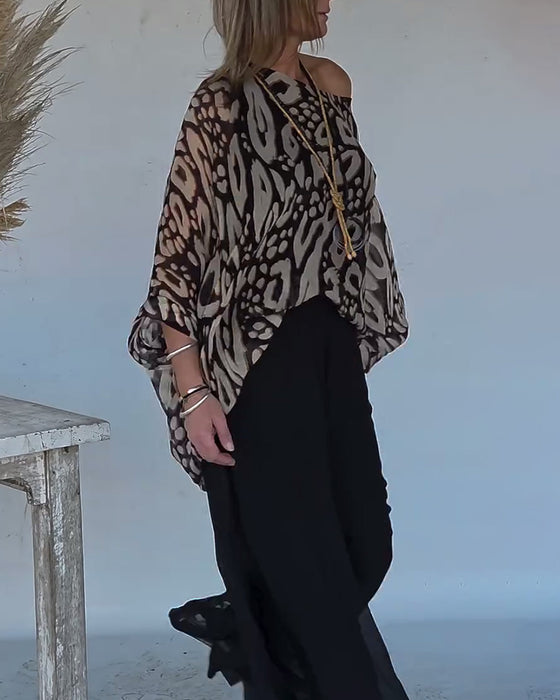 Langärmlige Bluse mit unregelmäßigem Fledermaus-Print