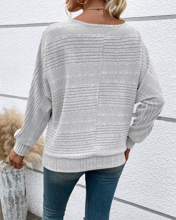 Einfarbiges Langarmshirt mit Rundhals und Streifen