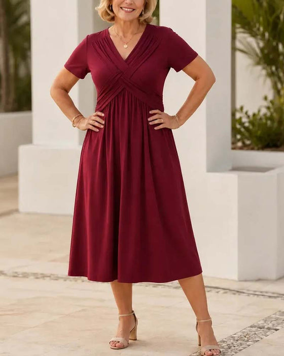 Kleid Kreuz V-Ausschnitt Figurbetonte Taille Kurzarm A-Linie