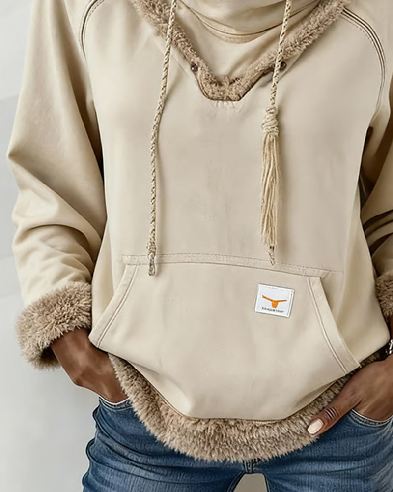 Langärmliges Sweatshirt mit Patchwork-Details und Tasche