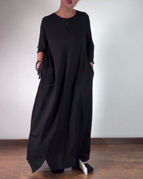 Einfarbiges, lockeres kleid mit rundhalsausschnitt