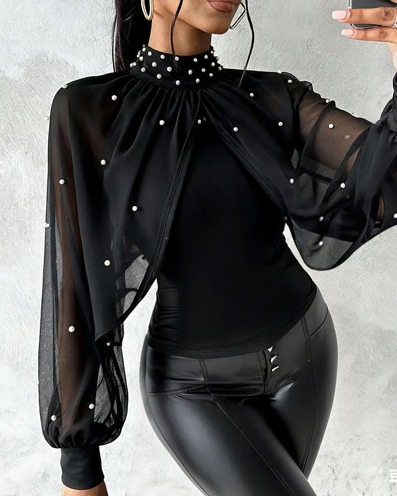 Top Mit Elegantem Stil Und Laternenarm Design