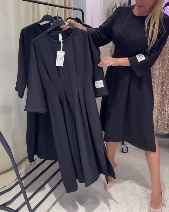 Elegantes Kleid mit einfarbigem Schlitz