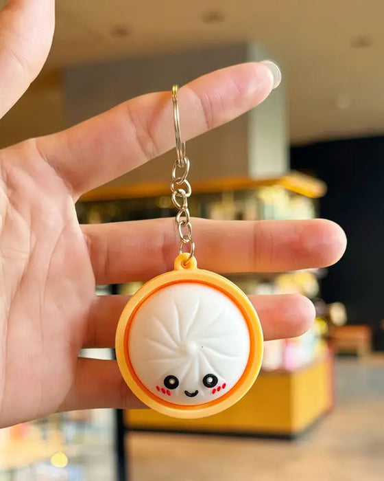 Süßes Dumpling Drückbares Leuchten Squishies Fidget Schlüsselanhänger