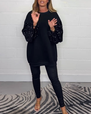 Lässiges pullover-sweatshirt mit rundhalsausschnitt und langen ärmeln