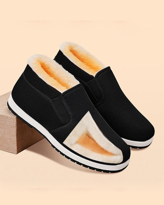 Herrenschuhe aus Baumwolle mit superwarmem Futter aus Kunstfell und rutschfester Sohle.