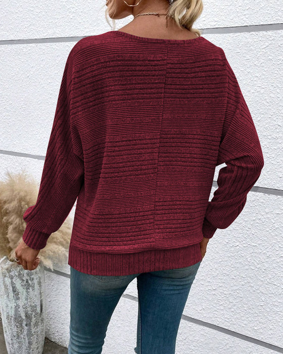 Einfarbiges Langarmshirt mit Rundhals und Streifen