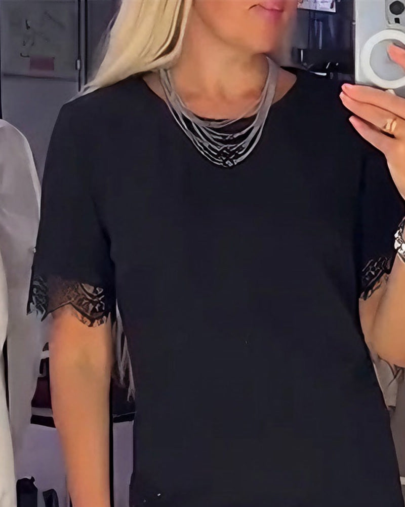 Spitzenkleid Mit Rundhalsausschnitt Und Seitenschlitzen