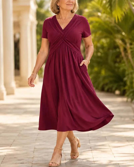 Kleid Kreuz V-Ausschnitt Figurbetonte Taille Kurzarm A-Linie