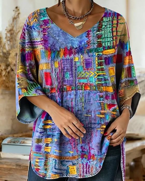 Bluse mit buntem geometrischem Druck und weiten Ärmeln