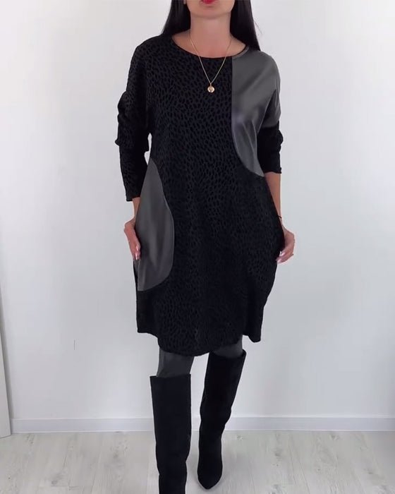 Elegantes kleid mit rundhalsausschnitt und einsätzen