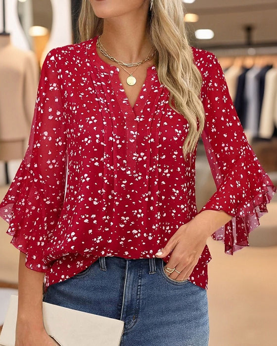 Bluse mit Polka-Dot-Muster und Rüschen