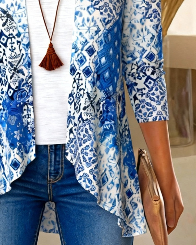 Bedruckte Bluse im Fake-Zweiteiler-Look mit unregelmäßigem Schnitt