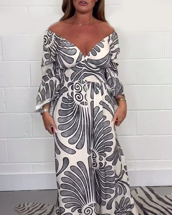 Lockerer jumpsuit mit tiefem v-retro-print und glockenärmeln